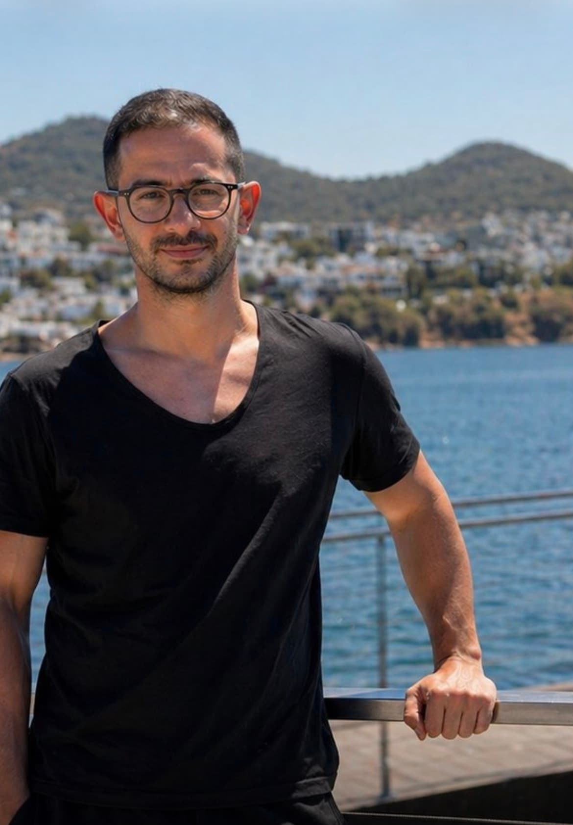 Mahmoud Y. Elguindi, founder of Ancient Reset, photographed at golden hour on the Mediterranean coast.